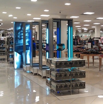 Fabricated aluminum floor displays with blue fluorescent lights