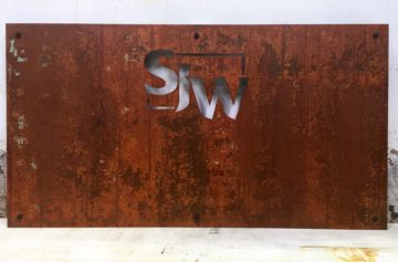 1/8” Steel with stencil cut letters and real rust finish